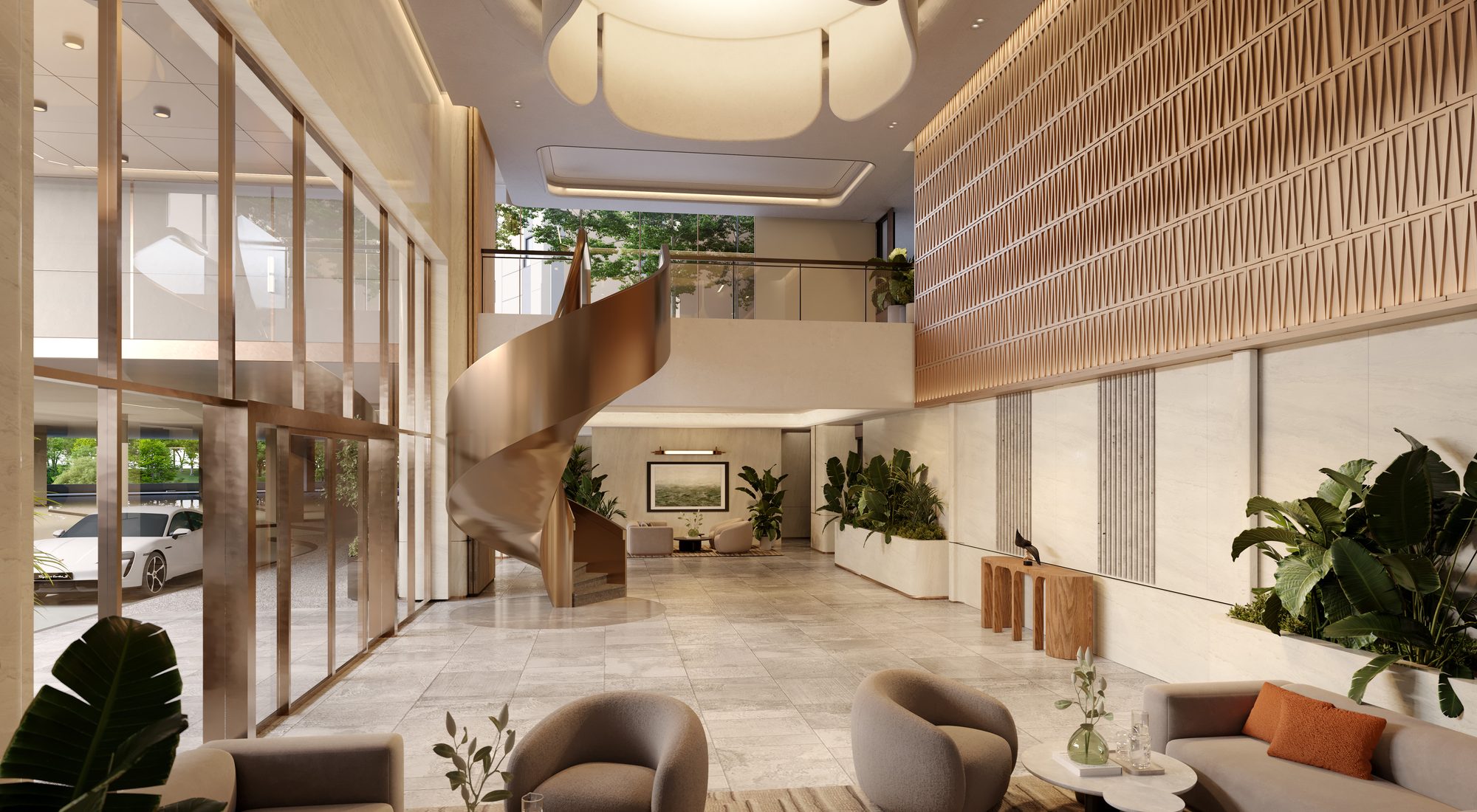 Double-volume residential lobby with sculptural staircase